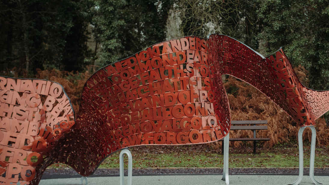 orange murmurations scultpure