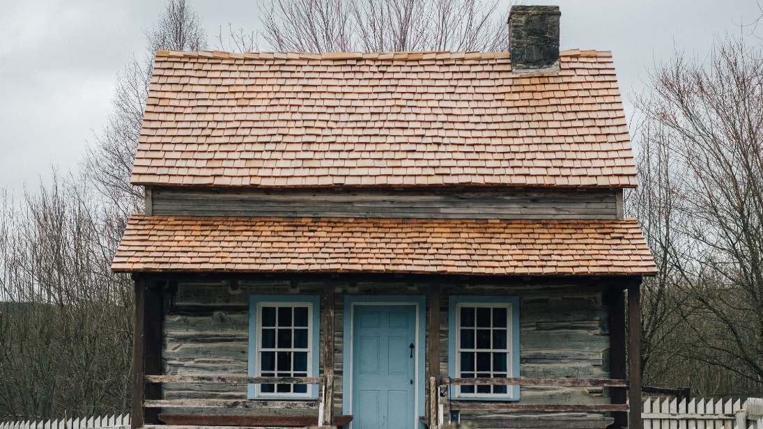 Western Pennsylvania Log House with a blue front door