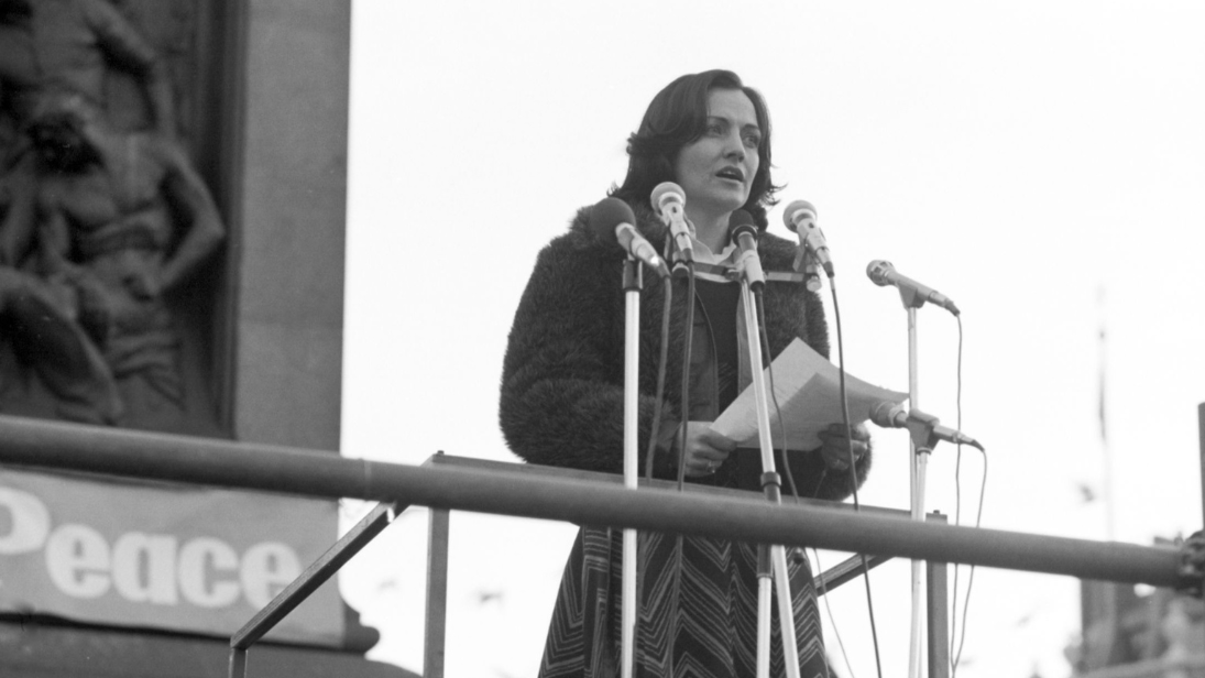 Black and white photograph of woman giving a speech