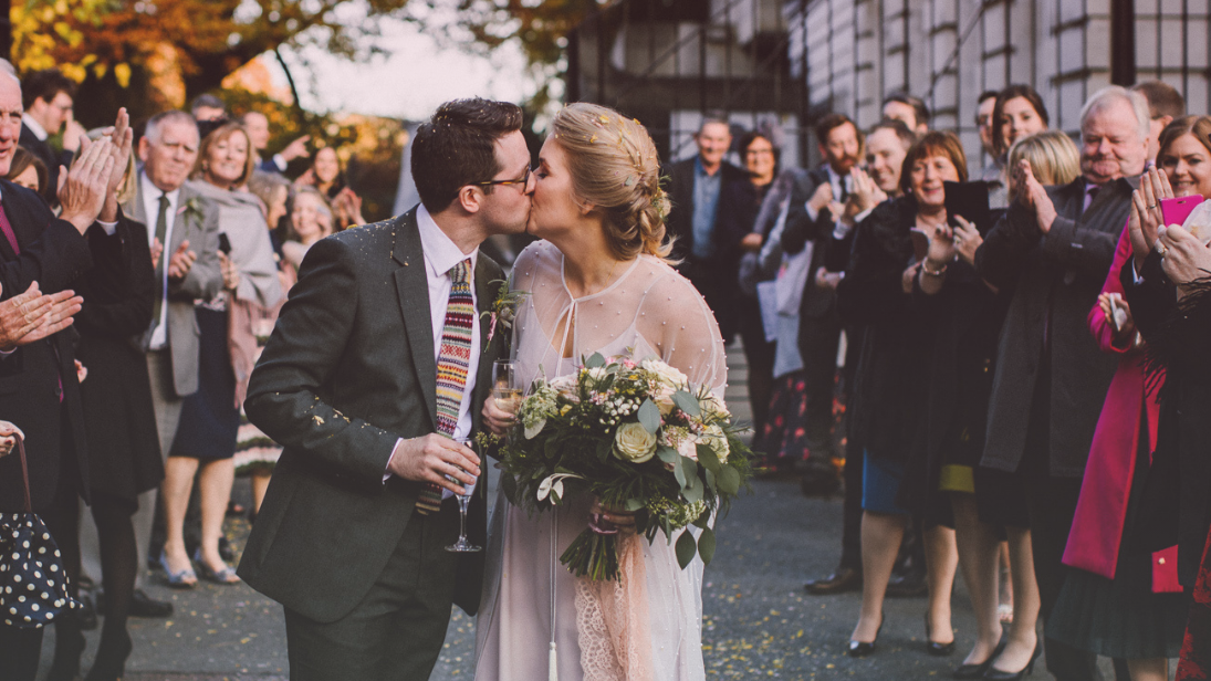 Image of a couple at their wedding outside the Ulster Museum