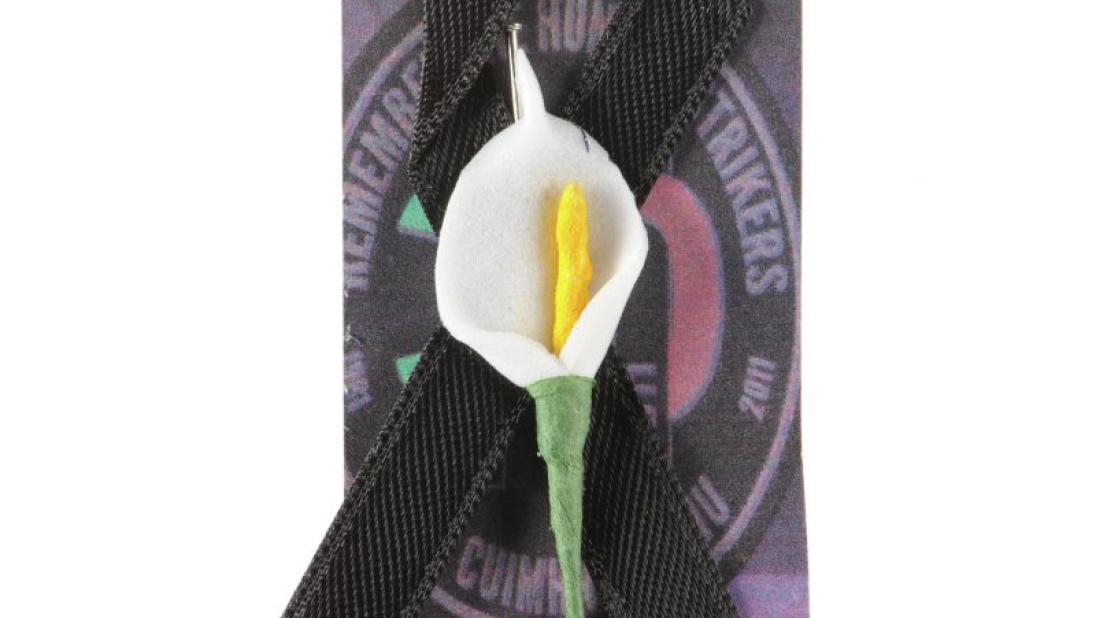 Black Ribbon and Lily Badge