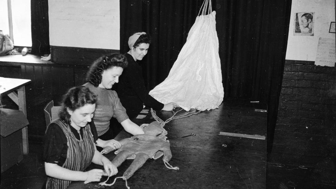 Women manufacturing dummies for parachutes