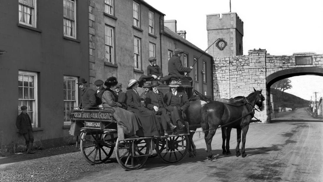 Two horse-drawn tourist long car, Carnlough