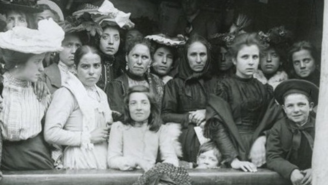 Group of women on a boat from Ireland to America, black and white.