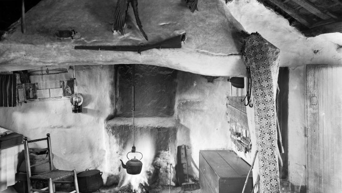 Interior of Irish handloom weaver’s cottage, black and white photograph