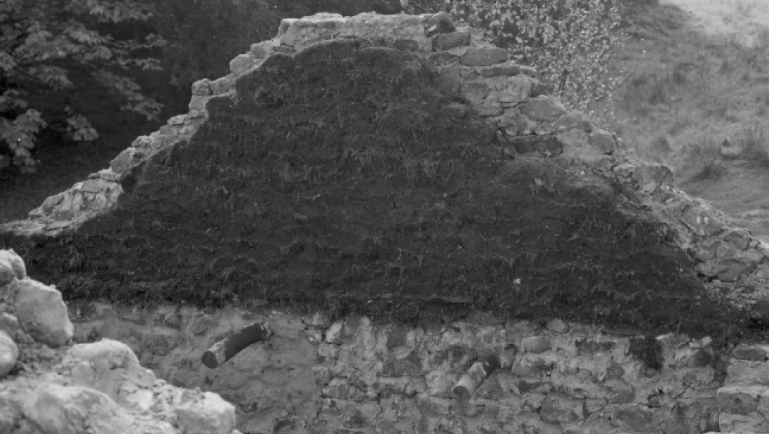 An image of the inside of a house roof, filled with sod