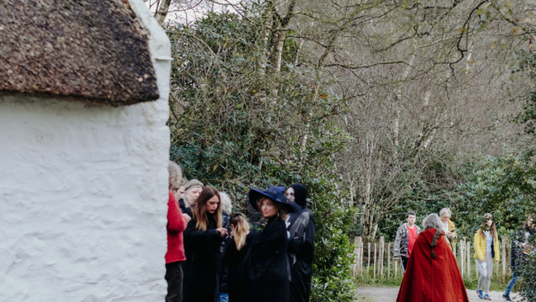 Gathered at an old cottage at the folk park