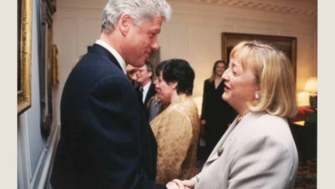 U.S President Bill Clinton shaking the hand of Monica McWilliams