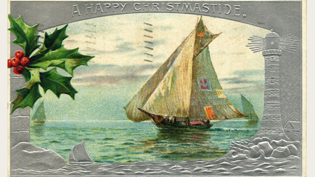 A Christmas postcard of a ship at sea.