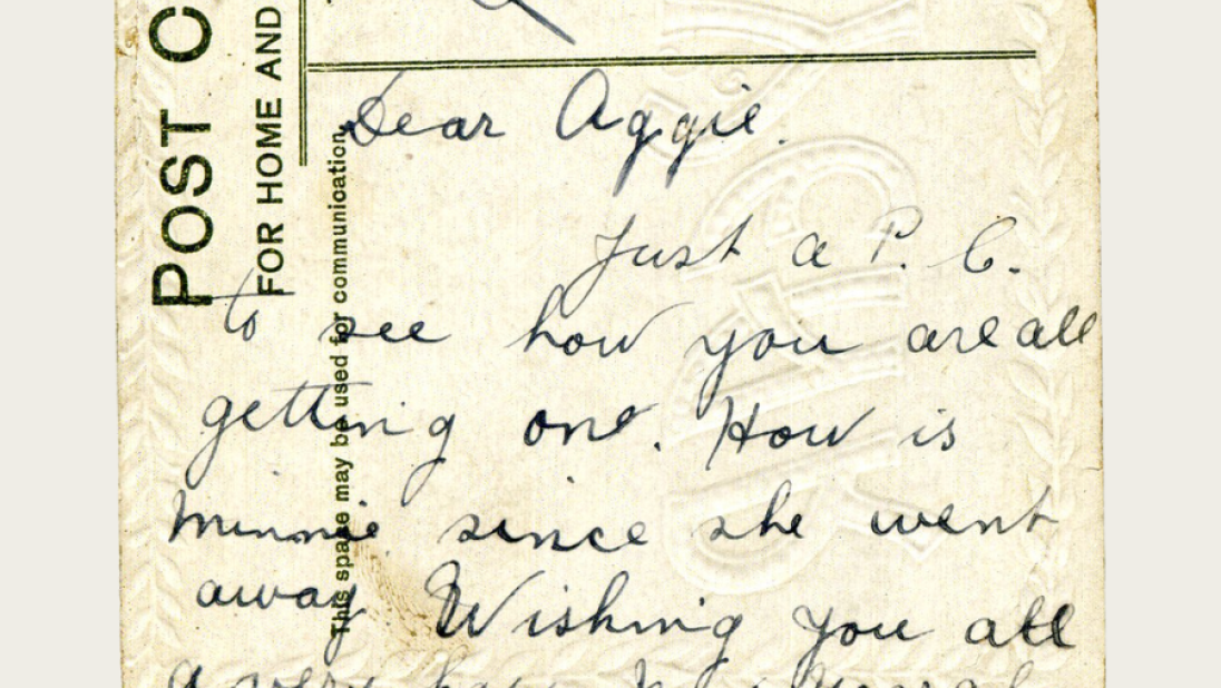 A postcard reading 'Dear Aggie, Just a P. C. to see how you are all getting on. How is Minne since she went away. Wishing you all a very happy new year'.