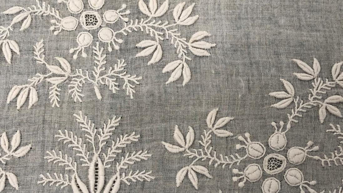 Detail of embroidery on a white dress collar from c.1860