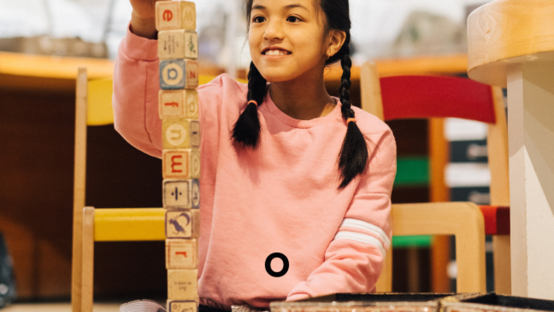 Young girl playing in discover history