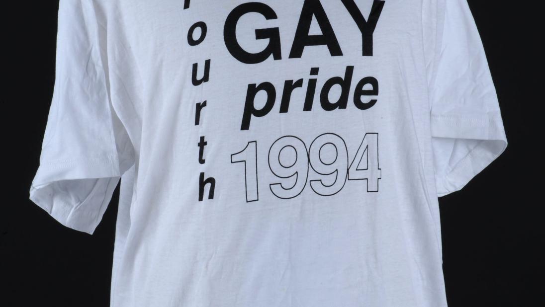 A white tshirt made for the fourth pride in Belfast. There is no logo, only stylised text 'Belfast Gay Pride 1994'.