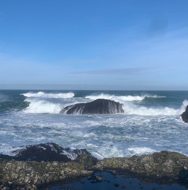 Waves crashing onto rocks