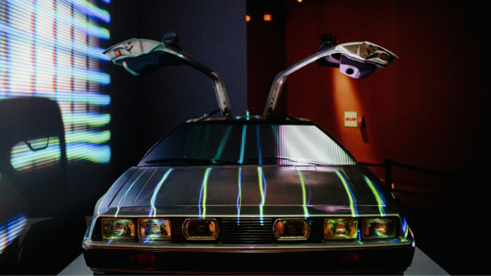 Lined projection over the DeLorean car with both doors open