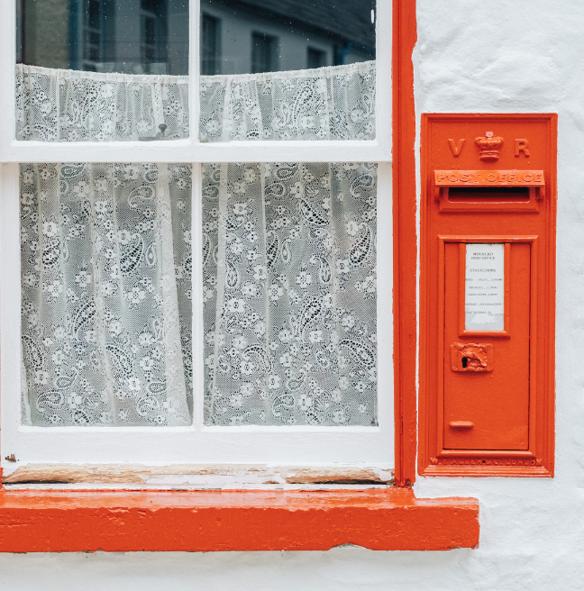 red windowsill and white wall