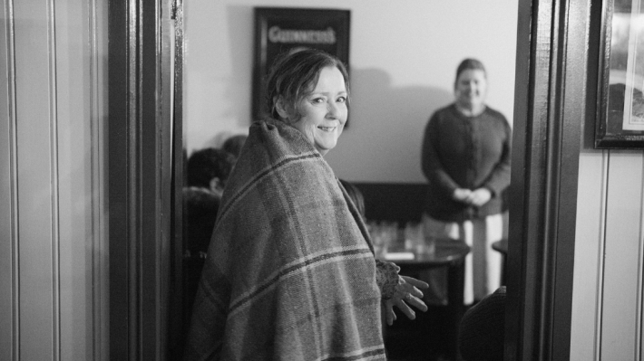A lady in a shawl in black and white