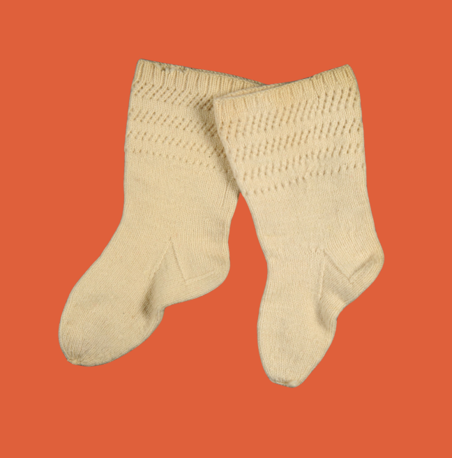 Small pair of cream children's socks