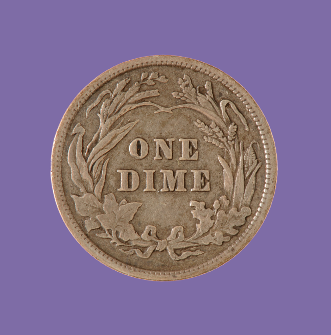 One dime coin on a purple background