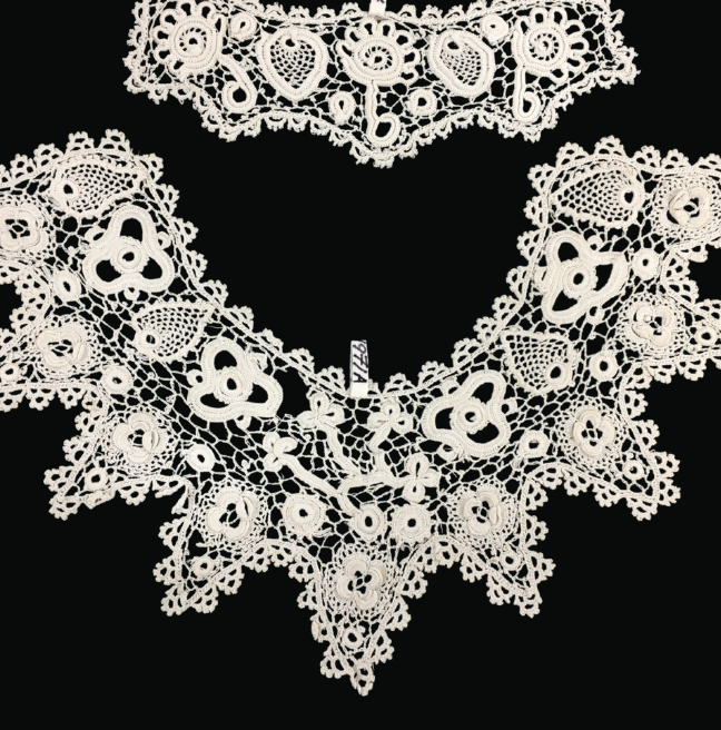 A collar of crochet lace incorporating traditional Irish symbols, including the triquetra.