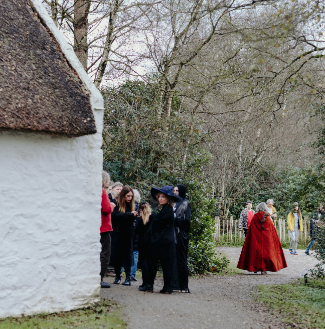 Gathered at an old cottage at the folk park