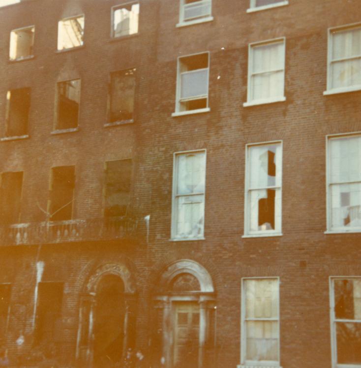 Coloured photograph of ruins of the British Embassy on Merrion Square, Dublin, after it was burned dow in response to the Bloody Sunday shooting in Derry