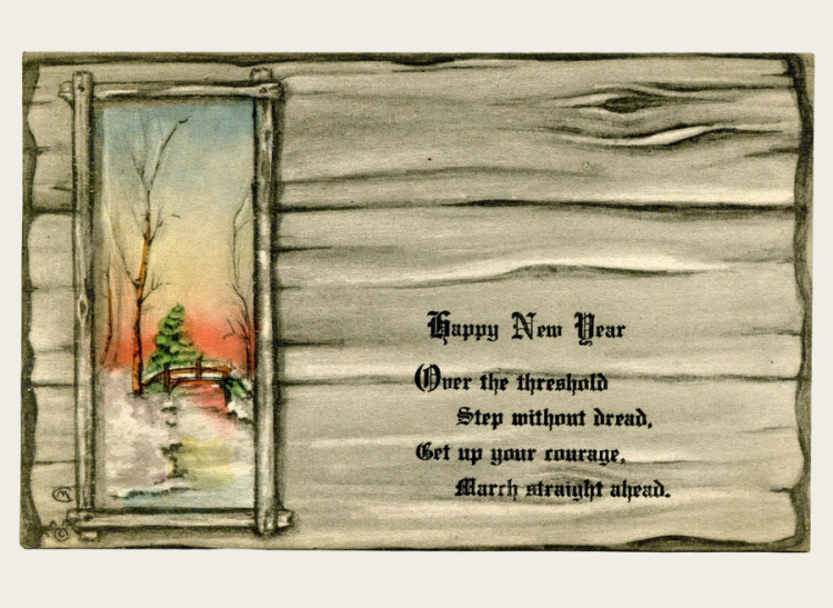 The front of a postcard with images of a log cabin wall and a wintery scene out of a window.