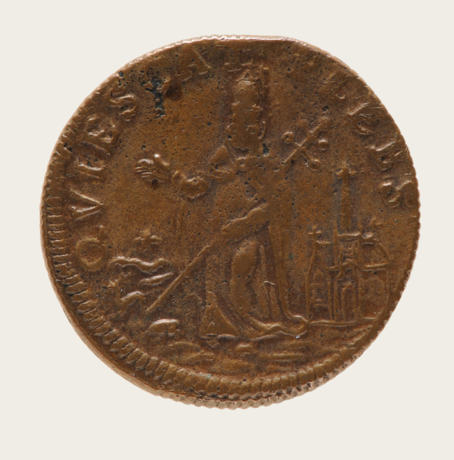 An old coin showing St. Patrick outside a church, ushering away reptiles.