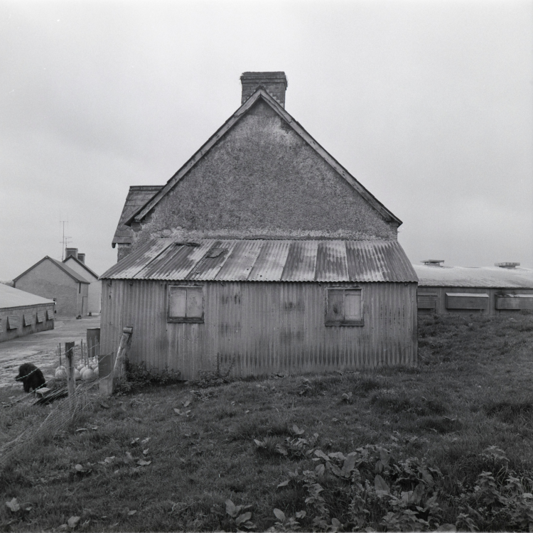 A black and white image of the side of an Orange Hall.