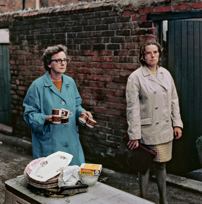  Local women standing near their burnt-out homes, Akihiko Okamura