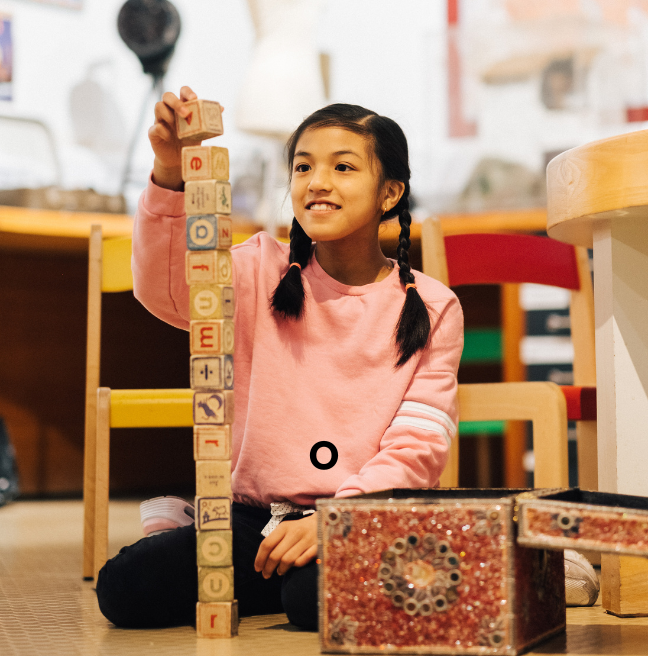 Young girl playing in discover history