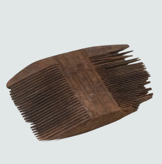A small wooden comb.