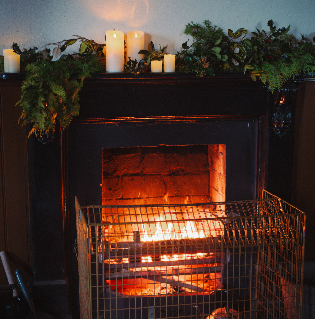 a lit fire at the ulster folk museum