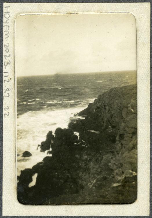 Small photograph of coastal scene,