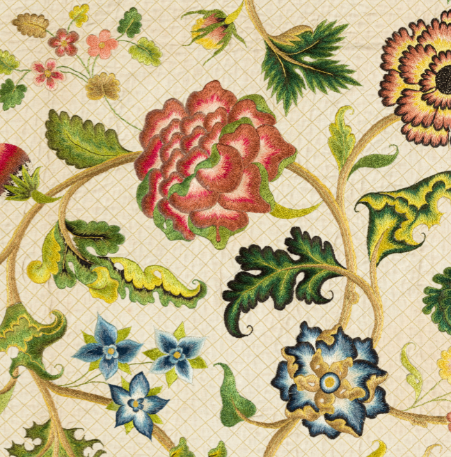 A detailed image of the Lennox Quilt showing large, many-petaled blue and red flowers, with small flowers, leaves and stems filling the rest of the image.
