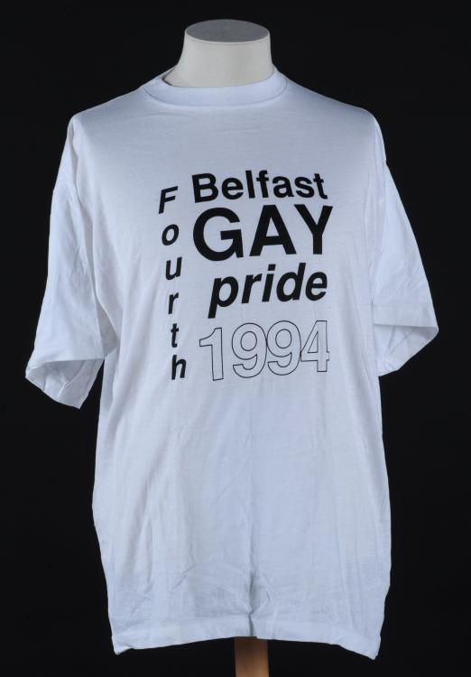 A white tshirt made for the fourth pride in Belfast. There is no logo, only stylised text 'Belfast Gay Pride 1994'.