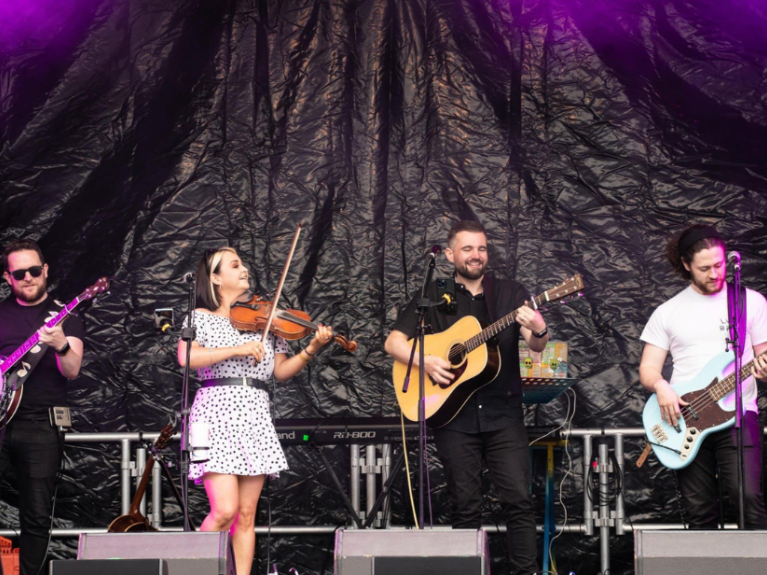 Cool Hand String Band playing on stage