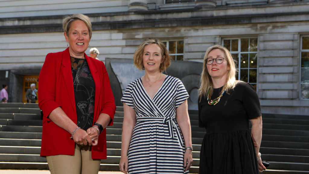 Kathryn Thomson, Chief Executive of National Museums NI, Emma Gallagher, Volunteer and Helen Connolly Volunteering and Participation Manager at National Museums NI standing together out the front of Ulster Museum