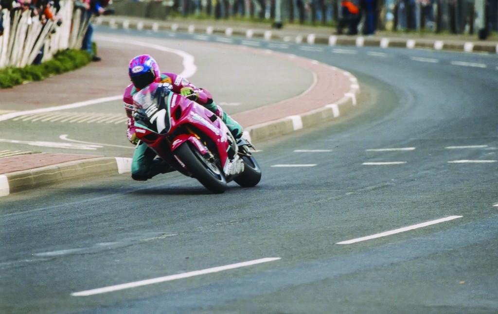 Ryan Farquhar drives bike