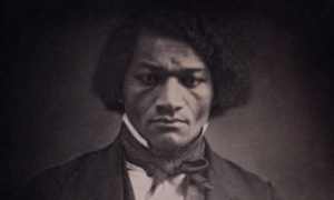 A black and white picture of Frederick Douglass