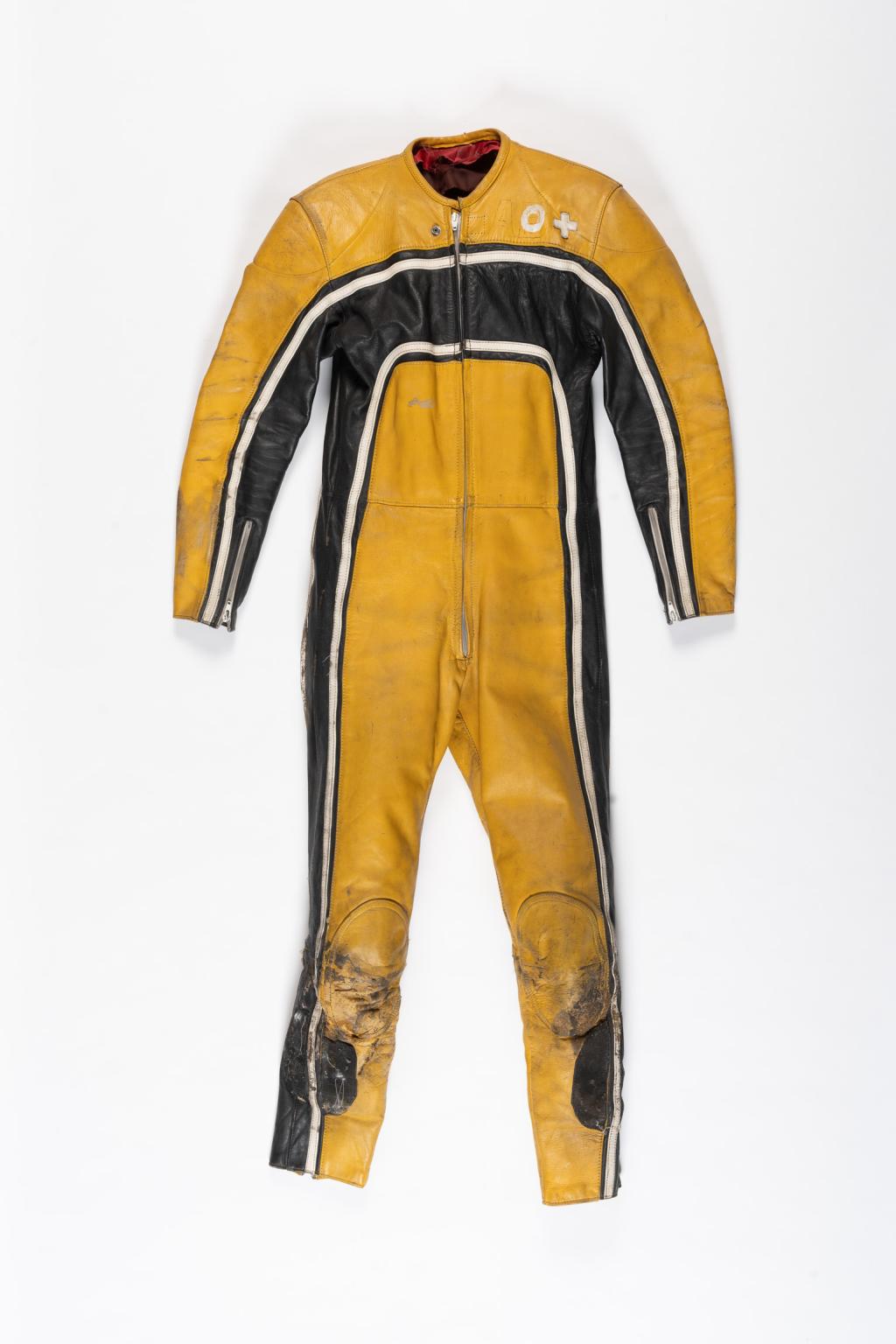 Robert Dunlop leathers, yellow black and white in colour, with 'Dunlop' etched on the leather