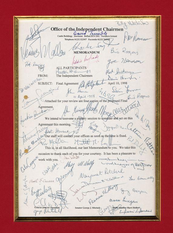 Signed Good Friday Agreement on a red background