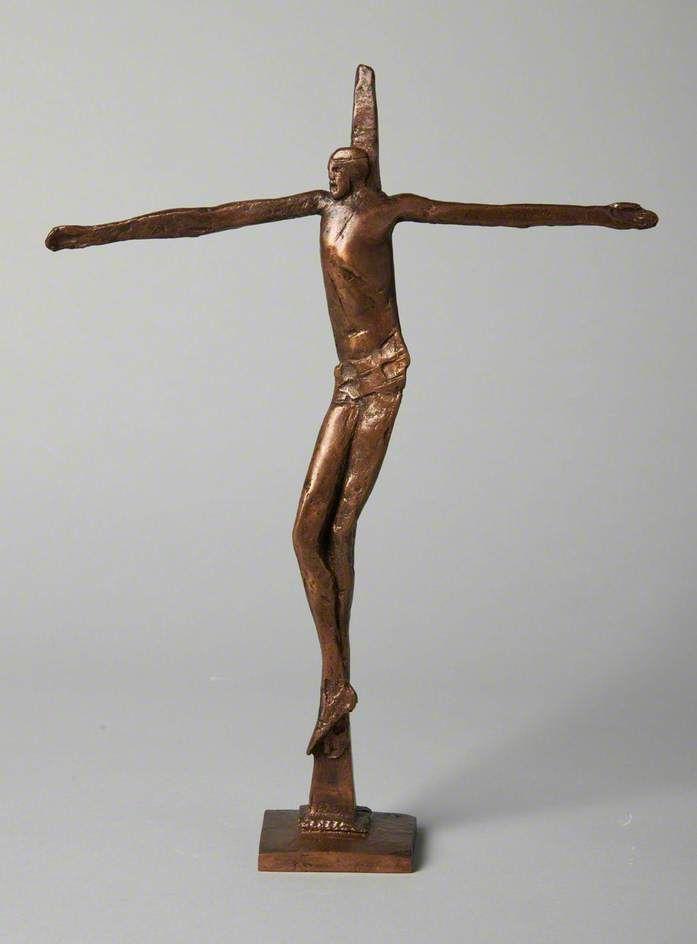 A small bronze statue of the crucifixion. 