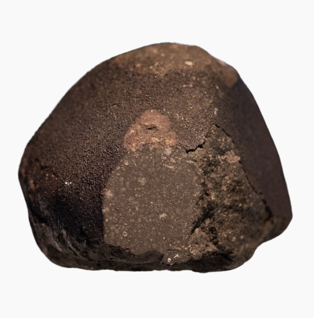 A roundish meteorite about the size of a small cannonball.
